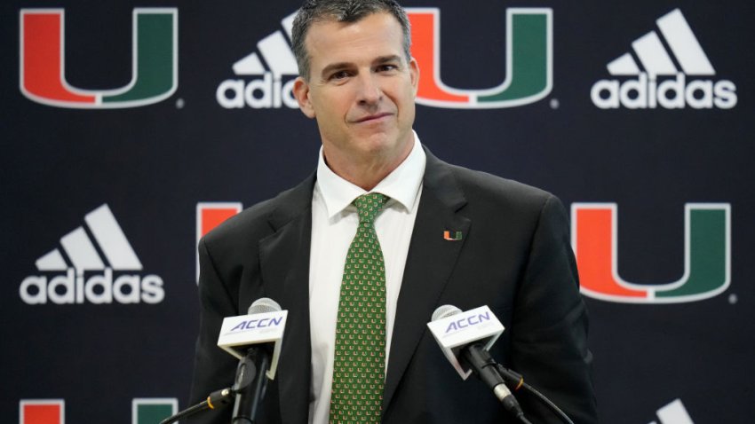 MIAMI, FLORIDA – DECEMBER 07: New Head Coach Mario Cristobal of the Miami Hurricanes speaks with the media during a press conference introducing him at the Carol Soffer Indoor Practice Facility at University of Miami on December 07, 2021 in Miami, Florida. Cristobal becomes the 26th head football coach in the program’s history. (Photo by Mark Brown/Getty Images)