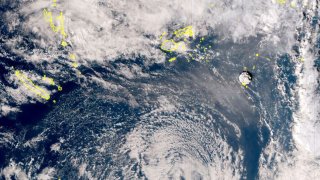 This satellite image taken by Himawari-8, a Japanese weather satellite, and released by the agency, shows an undersea volcano eruption at the Pacific nation of Tonga