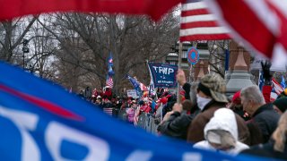 Supporters of President Donald Trump rally outside of the U.S. Capitol on Wednesday, Jan. 6, 2021, in Washington.