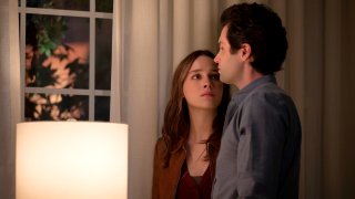 Victoria Pedretti as Love Quinn, left, and Penn Badgley as Joe Golldberg in a scene from "You."