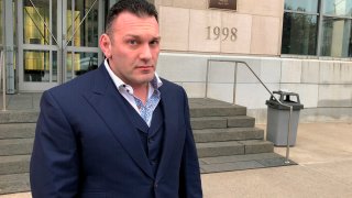 FILE - Perry Santillo walks outside the federal courthouse in Scranton, Pa., after pleading guilty to a federal fraud charge on Nov. 4, 2019. Santillo, once dubbed “King Perry”, was sentenced on Thursday, Jan. 13, 2022, to more than 17 years in prison for his role in masterminding a long-running investment scam that collected more than $115 million from 1,000 investors nationwide.