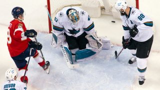 SUNRISE, FL – JANUARY 29: Sam Bennett #9 of the Florida Panthers scores the game winning goal in overtime against Goaltender James Reimer #47 of the San Jose Sharks at the FLA Live Arena on January 29, 2022 in Sunrise, Florida. (Photo by Eliot J. Schechter/NHLI via Getty Images)