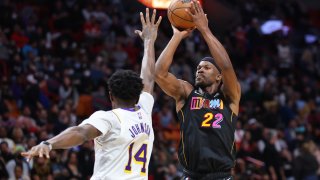 MIAMI, FLORIDA – JANUARY 23: Jimmy Butler #22 of the Miami Heat shoots over Stanley Johnson #14 of the Los Angeles Lakers during the second half at FTX Arena on January 23, 2022 in Miami, Florida. NOTE TO USER: User expressly acknowledges and agrees that, by downloading and or using this photograph, User is consenting to the terms and conditions of the Getty Images License Agreement. (Photo by Michael Reaves/Getty Images)