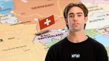Alex Hall in front of graphic of map of Switzerland.
