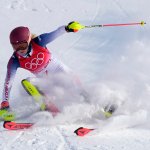 Mikaela Shiffrin, of the United States skis out in the first run of the women's slalom at the 2022 Winter Olympics, Wednesday, Feb. 9, 2022, in the Yanqing district of Beijing.
