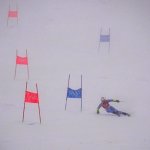 Luca De Aliprandini, of Italy passes a gate during the first run of the Men's Giant Slalom at the 2022 Winter Olympics, Feb. 13, 2022, in the Yanqing district of Beijing, China.