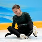 Kamila Valieva, of the Russian Olympic Committee, falls during a training session at the 2022 Winter Olympics, Feb. 13, 2022, in Beijing, China.