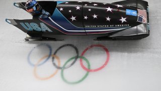 USA’s Kaillie Humphries competes in the Women’s Monobob Bobsleigh event at the Yanqing National Sliding Centre during the 2022 Winter Olympics in Yanqing, China on Feb. 13, 2022.