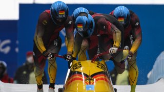 Johannes Lochner, Florian Bauer, Christopher Weber and Christian Rasp of Team Germany slide during the four-man Bobsleigh heats on day 15 of 2022 Winter Olympics at National Sliding Centre on Feb. 19, 2022, in Yanqing, China.