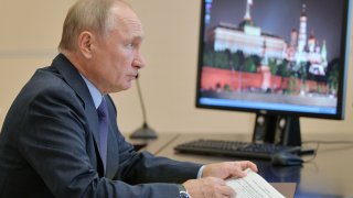 Russian President Vladimir Putin chairs a meeting with members of the government via a teleconference call at the Novo-Ogaryovo state residence, outside Moscow, on September 29, 2020.