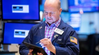 Traders on the floor of the NYSE, March 4, 2022.
