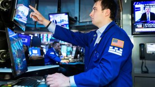 Trader on the floor of the NYSE, March 9, 2022.