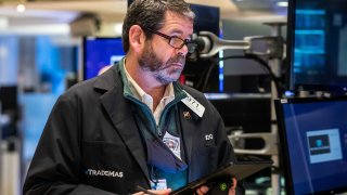 Traders on the floor of the NYSE, March 17, 2022.
