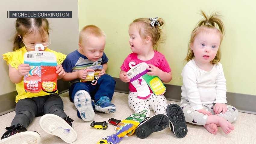 Students at Pediatrics Plus in Frisco show off colorful socks.