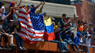 anti-government protesters venezuela flag us flag