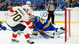BUFFALO, NY – MARCH 07: Patric Hornqvist #70 of the Florida Panthers scores a second period goal against Craig Anderson #41 of the Buffalo Sabres during an NHL game on March 7, 2022 at KeyBank Center in Buffalo, New York. (Photo by Ben Green/NHLI via Getty Images)