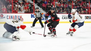 OTTAWA, ON – MARCH 26: Alex Formenton #10 of the Ottawa Senators scores a first period goal against Sergei Bobrovsky #72 and Aleksander Barkov #16 of the Florida Panthers at Canadian Tire Centre on March 26, 2022 in Ottawa, Ontario, Canada. (Photo by André Ringuette/NHLI via Getty Images)