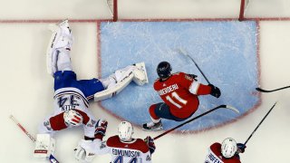 SUNRISE, FL – MARCH 29: Jonathan Huberdeau #11 of the Florida Panthers scores a goal against Goaltender Jake Allen #34 of the Montreal Canadiens at the FLA Live Arena on March 29, 2022 in Sunrise, Florida. (Photo by Eliot J. Schechter/NHLI via Getty Images)