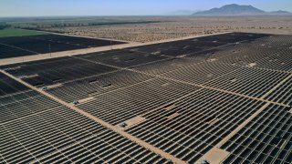 Arrays of photovoltaic solar panels are seen at the Tenaska Imperial Solar Energy Center South in this aerial photo taken over El Centro, California, U.S., May 29, 2020. Picture taken with a drone.