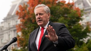 FILE – White House chief of staff Mark Meadows speaks with reporters at the White House, Wednesday, Oct. 21, 2020, in Washington.