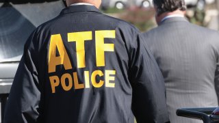 FILE - ATF Agents