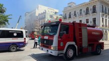 Rescuers work after an explosion in the Saratoga Hotel in Havana, on May 6, 2022. A powerful explosion destroyed part of a hotel under repair in Cuba's capital.