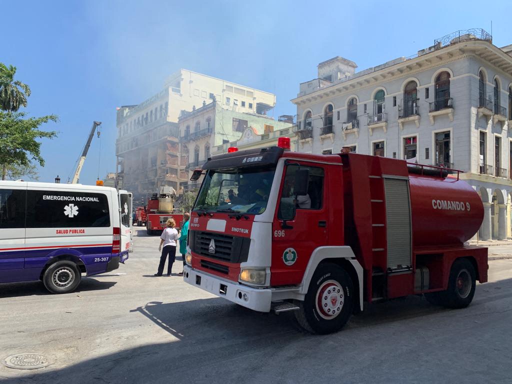 Rescuers work after an explosion in the Saratoga Hotel in Havana, on May 6, 2022. A powerful explosion destroyed part of a hotel under repair in Cuba's capital.