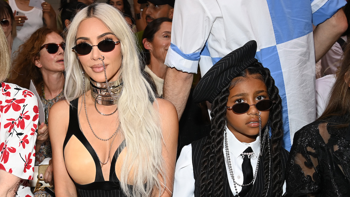 This Is Why North West Held Up ‘Stop’ Sign at Paris Fashion Show This Is Why North West Held Up ‘Stop’ Sign at Paris Fashion Show