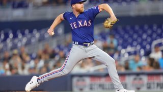MIAMI, FLORIDA – JULY 21: Jon Gray #22 of the Texas Rangers delivers a pitch during the first inning against the Miami Marlins at loanDepot park on July 21, 2022 in Miami, Florida. (Photo by Michael Reaves/Getty Images)