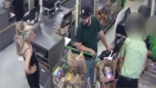 Deputies are looking for a man who was caught on surveillance in a Tamarac Publix swiping the forgotten credit card of the customer in front of him.