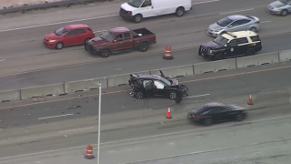 At least one person was hospitalized after a crash that shut down the southbound side of Florida’s Turnpike in northwest Miami-Dade on Friday.
