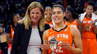 WNBA commissioner Cathy Engelbert presents the WNBA All Star Game MVP Award to Team Wilson guard Kelsey Plum at Wintrust Arena. (Credit: USA TODAY Sports)