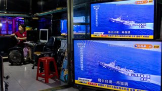 A television shows a news broadcast about China Conducting a live file drill around Taiwan at a local electrical repair store after Speaker of the House Nancy Pelosi’s visit on August 04, 2022 in Taipei, Taiwan.