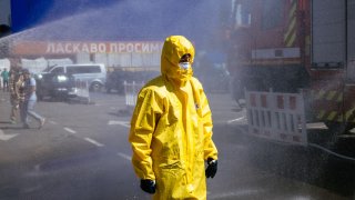 A Ukrainian Emergency Ministry rescuer attends an exercise in the city of Zaporizhzhia on Aug. 17, 2022, in case of a nuclear accident at the Zaporizhzhia nuclear power plant located near the city.