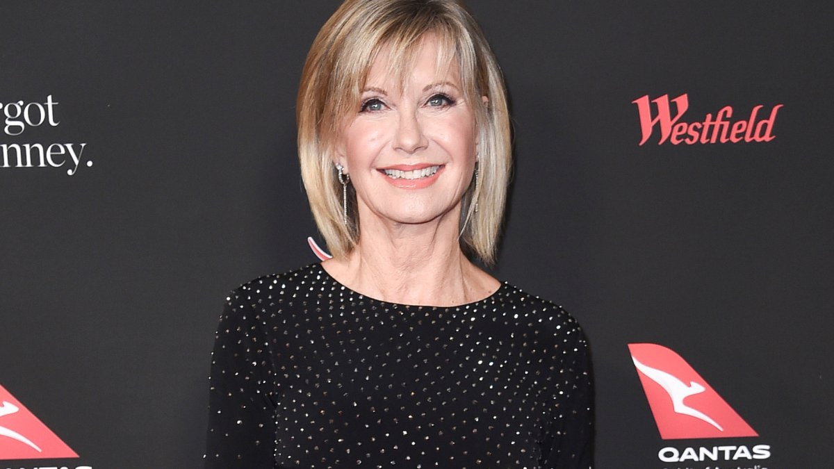 Distinctive: Olivia Newton-John’s Widower Claims He Carries on to ‘Speak to Her Out Loud’