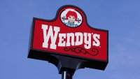 A photo shows a sign over a Wendy's restaurant in Des Moines, Iowa, on Feb. 25, 2021.