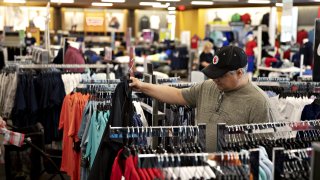 A shopper browses clothing at a Kohl’s Corp. department store in Peru, Illinois