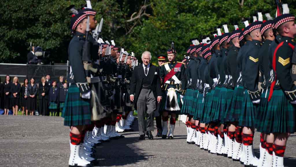 King Charles III inspects the Guard of Honor as he arrives for the Ceremony of the Keys at the Palace of Holyroodhouse, Sept. 12, 2022, in Edinburgh, Scotland. The monarch is handed the keys of the city of Edinburgh and welcomed to “your ancient and hereditary kingdom of Scotland” in this ancient ritual. The King then returns them to Edinburgh’s elected officials for safekeeping.