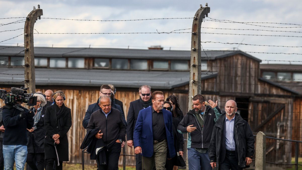 Arnold Schwarzenegger Visits Auschwitz in Concept to ‘Terminate’ Hatred