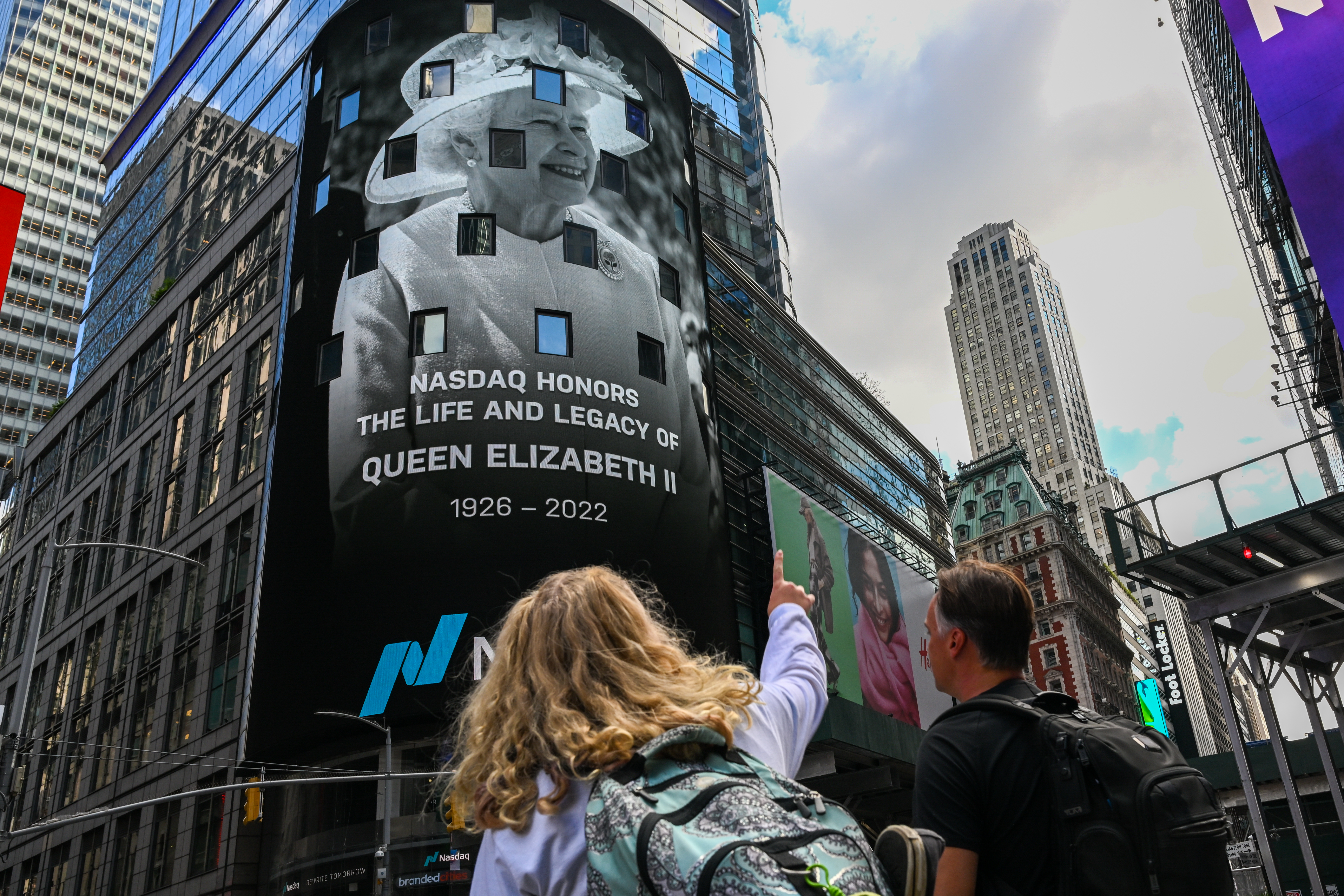 A Nasdaq billboard pay tribute to the life and legacy of Queen Elizabeth II in Times Square on Sept. 8, 2022 in New York, New York.