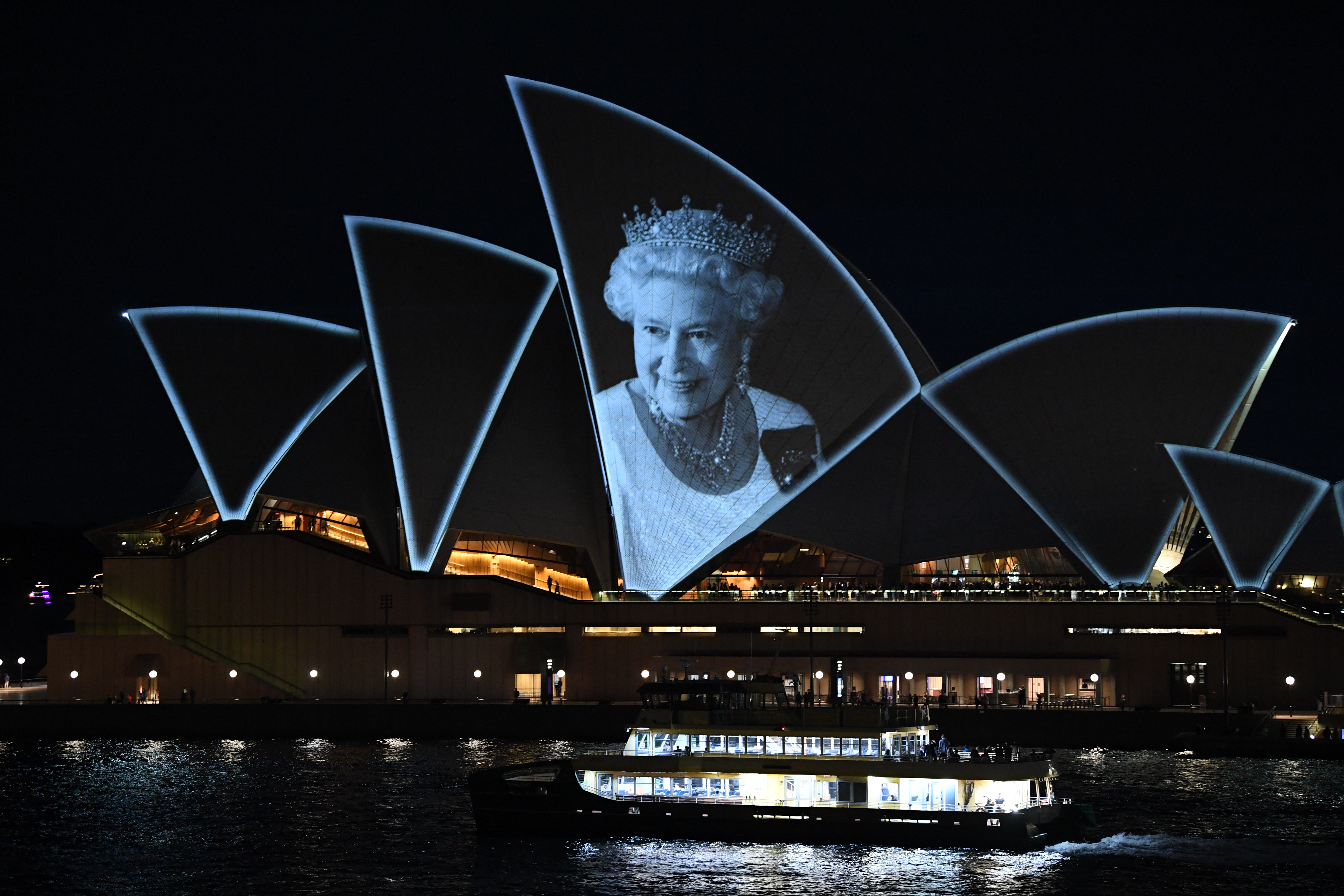 A photo of Queen Elizabeth II is projected onto the sails of the Sydney Opera House, Sept. 9, 2022, in Sydney, Australia.