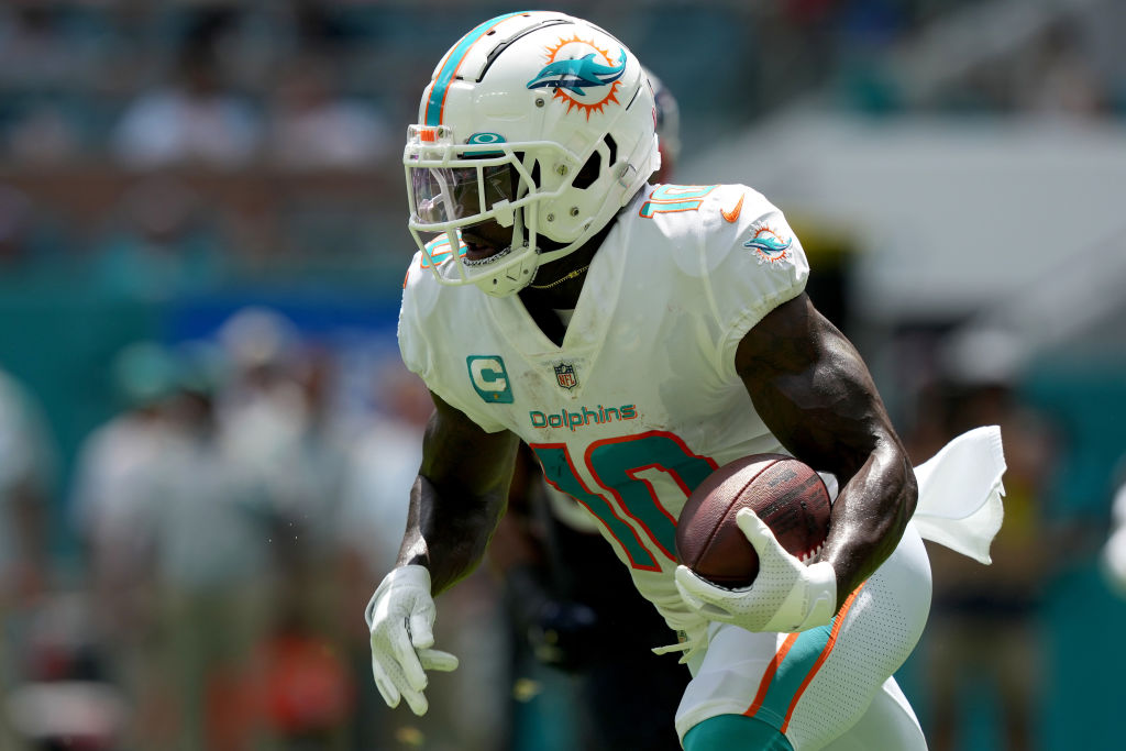 Tyreek Hill Miami Dolphins Unsigned Running the Ball Photograph