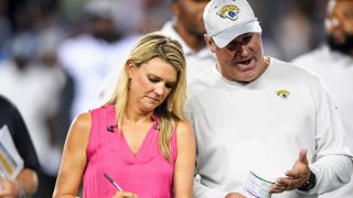 NBC Sports field reporter Melissa Stark interviews head coach Doug Pederson of the Jacksonville Jaguars at halftime of the 2022 Pro Football Hall of Fame Game against the Las Vegas Raiders at Tom Benson Hall of Fame Stadium on August 04, 2022 in Canton, Ohio.