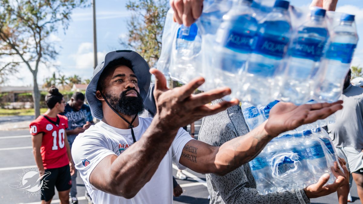 Miami Dolphins Help Distribute Goods in Southwest Florida After Hurricane Ian