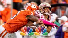 CLEMSON, SOUTH CAROLINA - OCTOBER 30: Defensive end Xavier Thomas #3 of the Clemson Tigers forces a fumble from quarterback Jordan Travis #13 of the Florida State Seminoles during the third quarter during their game at Clemson Memorial Stadium on October 30, 2021 in Clemson, South Carolina. (Photo by Jacob Kupferman/Getty Images)