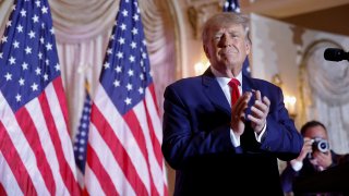 Former U.S. President Donald Trump claps as he announces that he will once again run for U.S. president in the 2024 U.S. presidential election during an event at his Mar-a-Lago estate in Palm Beach, Florida, November 15, 2022.