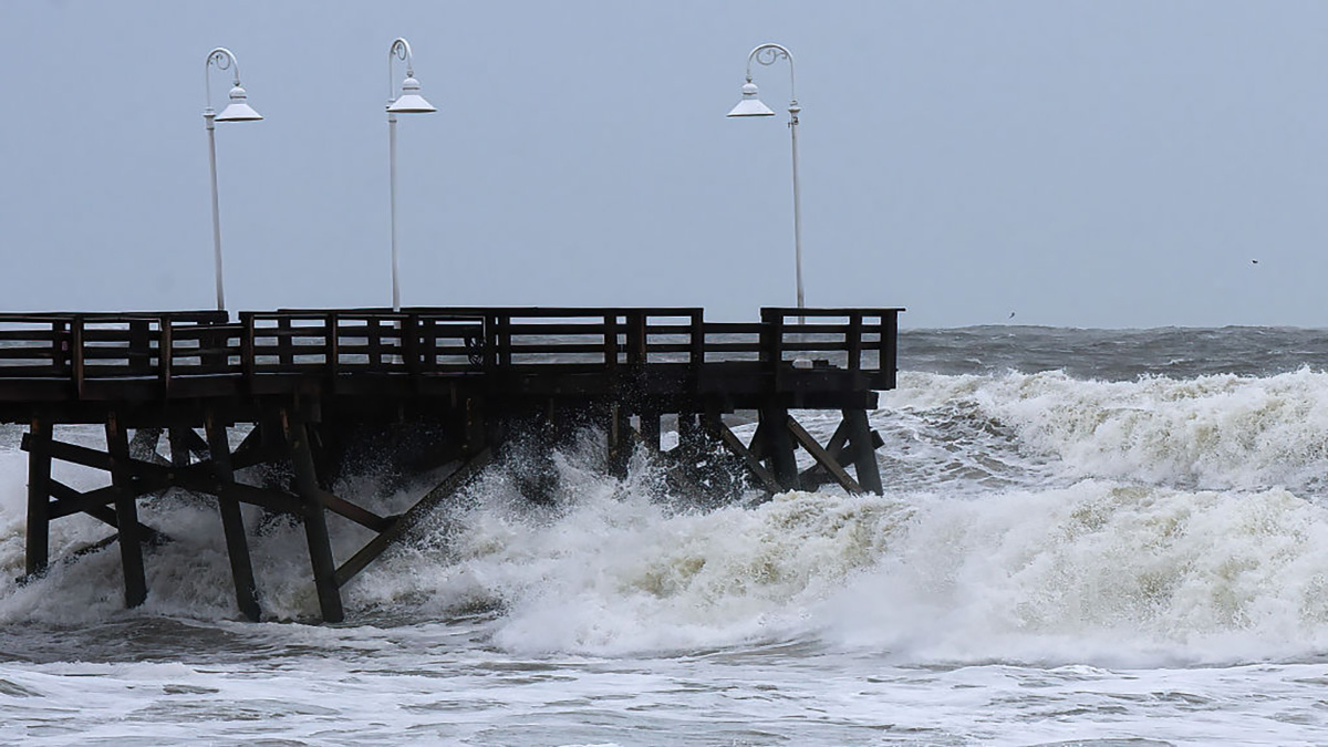 DAYTONA BEACH, UNITED STATES – 2022/11/09: Waves crash into the pier at Daytona Beach, Florida, as Tropical Storm Nicole approaches the coast of Florida with an expected landfall as a category 1 hurricane. (Photo by Paul Hennessy/SOPA Images/LightRocket via Getty Images)