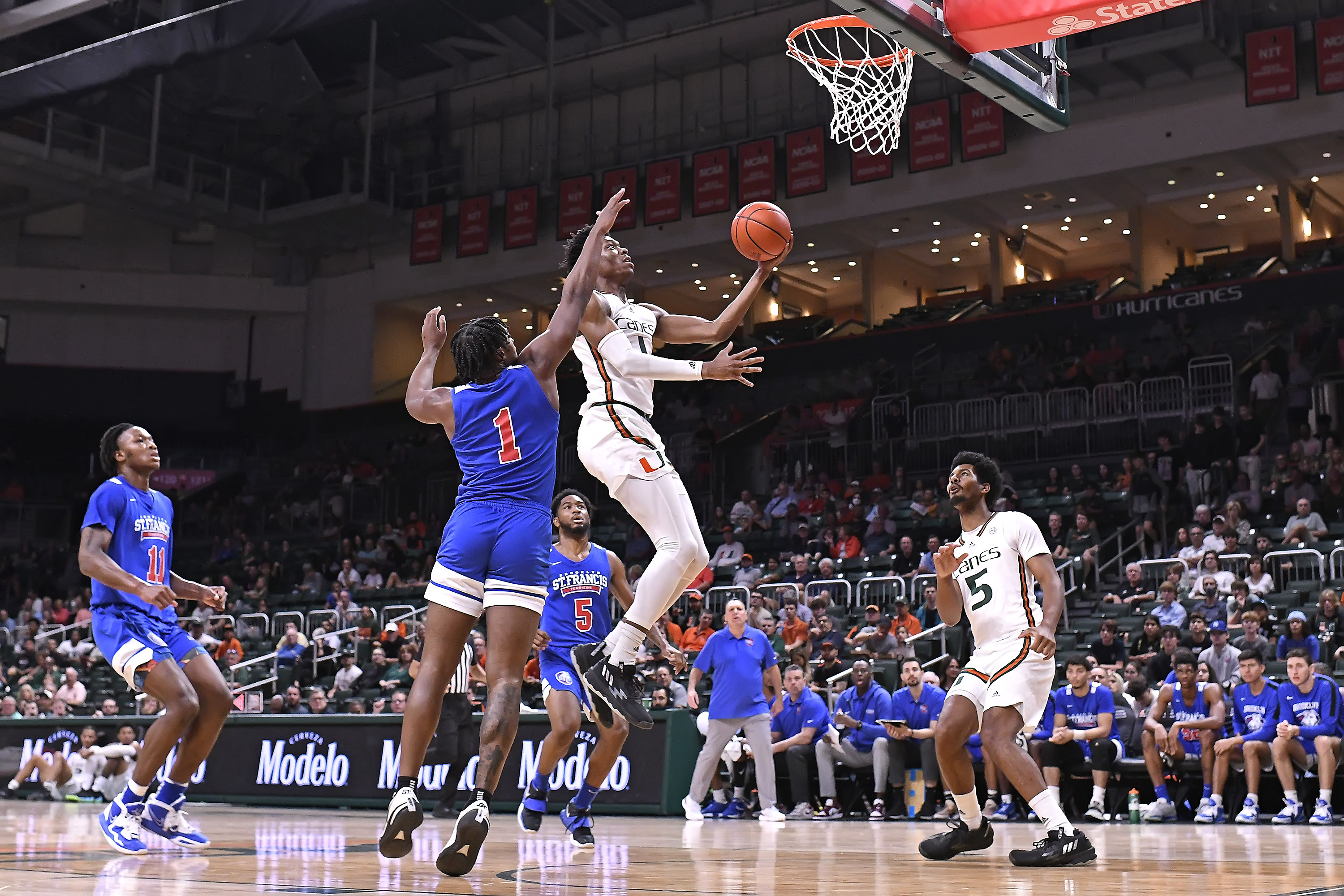 Pack, Omier Lead Way in Miami's 79-56 Win Over Terriers