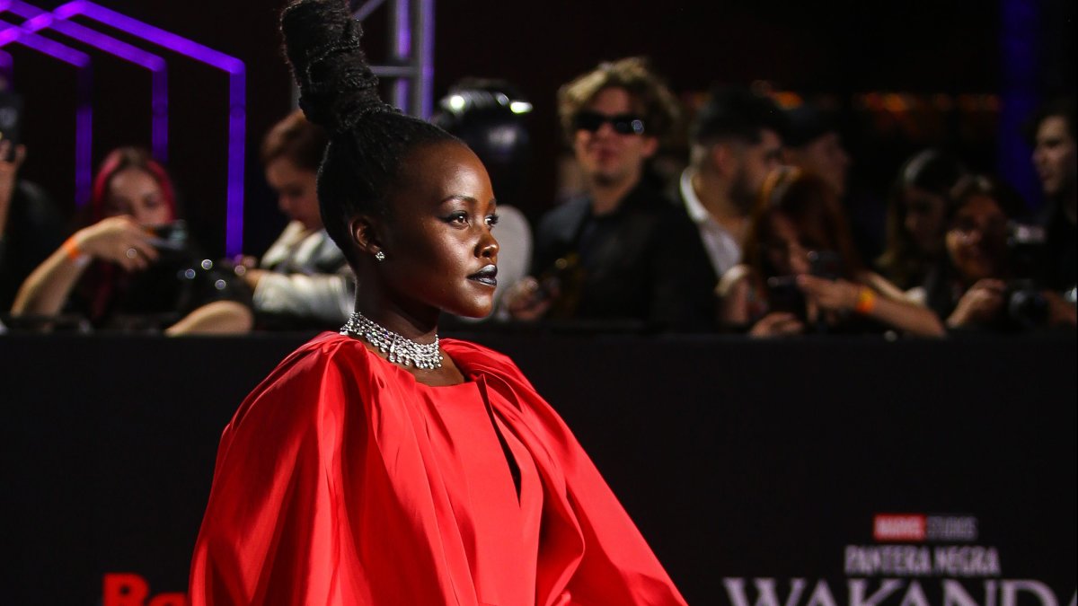 ‘Black Panther’ Star Lupita Nyong’o Can make Magnificent Outfit Adjust on the Purple Carpet