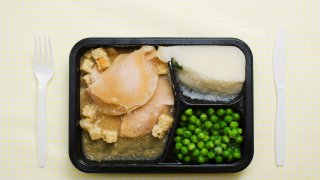 Photo of a frozen tv dinner.